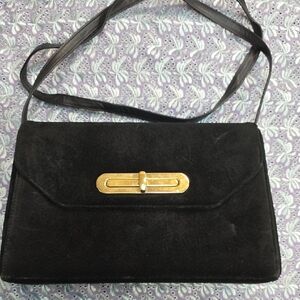 Elegant Black Suede Handbag with Gold Accent